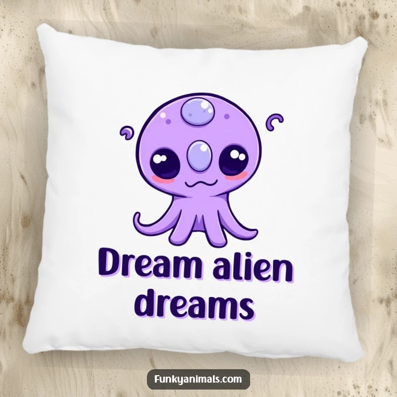 Funny pillow featuring a cute purple alien with three eyes wiggling its tentacles, offering soft comfort and a playful, cosmic design.