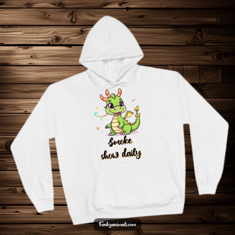 Funny green dragon hoodie with a goofy grin exhaling vibrant smoke rings, a warm and humorous apparel choice for gifting.